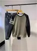 Nuevo suéter de punto de cuello redondo para otoño e invierno, suéter vintage con costuras de color contrastante