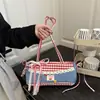 Bolsa de Mão Estilo Coreano Doce e Fresca com Acabamento em Renda 2026 Moda Retrô Bolsa de Mão Xadrez com Contraste Vermelho e Azul