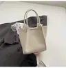Bolso tipo cubo casual transfronterizo para mujer 2025 nuevo bolso bandolera simple de gran capacidad bolso de hombro sencillo y a la moda para ir al trabajo