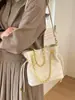Bolso de Mano Tipo Cubo con Cadena Acanalada Estilo Coreano de Nicho para Mujer 2026 Modelo Nuevo Bolso de Hombro Cruzado con Cordón Plegado