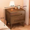 Mesita de noche de madera maciza para dormitorio del hogar 2026 Venta caliente Creativa Pequeño Armario de almacenamiento simple para niños Mesita de noche de tronco