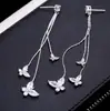 Joyería de moda coreana nuevo deseo Amazon AliExpress ebay pendientes de botón con borla de mariposa de cristal al por mayor