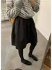 ¡Muy recomendable! Falda A-line de lana vintage para mujer, nueva falda de otoño e invierno estilo coreano minimalista plisada adelgazante de longitud media