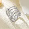 Comercio exterior transfronterizo europeo y americano anillo de corazón con líneas irregulares de acero inoxidable anillo abierto ajustable de nicho de alta gama joyería para manos