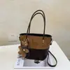 Nuevos Dijes para Bolsos Mini Simples Sensación de Alta Gama Bolsos de Tote Perezosos para Vacaciones para Mujeres Otoño Invierno Bolsos de Mano Retro