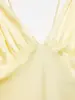Venta Caliente de Aliexpress Primavera 2026 Nuevo Estilo Francés Deseo Puro Amarillo Claro Sexy Cuello en V Profundo Tirantes Finos Vestido Largo