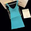 Vestido de tirantes con cordones y escote en U estilo sexy para mujer Verano Nuevo Aspecto adelgazante Falda sexy ajustada a la cadera Falda corta que ciñe la cintura