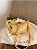 Bolsa feminina 2026 modelo novo primavera-verão, bolsa pequena transversal versátil, bolsa de chifre nicho, bolsa transversal de ombro estilo bolinho