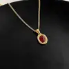 Collar con colgante de circonita roja de Año Nuevo para mujer, ideal para otoño e invierno, con cadena para suéter que combina con todo y cadena para clavícula.