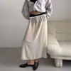 Falda Satinada Nueva de Color Sólido Elástica de Cintura Alta Línea A con Atmósfera Francesa y Efecto Plisado para Mujer Otoño/Invierno 2026