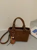 Otoño 2026 Nuevo Estilo Coreano Bolso de Mano Sencillo Bolso Cubo Sencillo de Moda Bolso de Hombro Único con Textura Bolso Cruzado