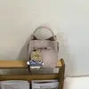 Bolsa de Mão Retrô Transfronteiriça para Mulheres Moda Primavera 2026 Bolsa Saco Design de Nicho Bolsa Transversal para Mulheres Conjunto
