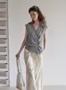 Top de punto sin mangas de estilo europeo minimalista de alta gama en color gris irregular de un solo botón para verano 867