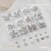 Accesorios para Uñas Artísticas Caja de 12 Compartimentos Mariposa Metálica Mixta Cuervo Corazón Cruz Cinta Lazo Decoración para Uñas de Forma Especial