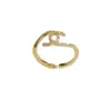 Anillo abierto de moda estilo Chanel simple con cruz de circón exquisito luz de lujo versátil sensación de alta gama súper brillante anillo para dedo índice al por mayor