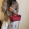 Bolso de mano de alta costura transfronterizo tipo cubo para mujer, nuevo modelo otoño 2026, bolso casual de hombro y cruzado con lunares grandes