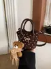 2026 Nova Bolsa de Ombro Único de Outono Feminina Estilo Fofo Bolinhas Versátil Retro Mini Bolsa Transversal