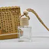 Frasco cilíndrico de madeira de lótus de 8ML com tampa de cinco linhas e 13 dentes, conjunto de tampa de madeira para difusor de carro com pingente de corda, fabricante de frascos de aromaterapia atacado