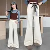 Pantalones de Campana para Niñas de Primavera y Otoño 2026 Nuevos Casuales Estilo Coreano Ajustados Ligeramente Acampanados Largos para Niñas Mayores, Modernos para Exportación