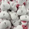 Lindo Conejito Blanco Cabeza Dibujo Animado Loopy Dibujo Animado Peluche Broche Calcetines Muñeca Muñeca