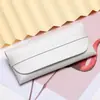 Nuevo estuche de gafas de sol tipo cassette de moda portátil estuche de gafas de cuero personalizado bolsa suave para gafas de cuero de PVC al por mayor