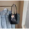 Bolsa de Ombro/Axila Casual Simples de Grande Capacidade Retro Cor Sólida com Padrão Trançado para Mulheres - Estilo Novo da Primavera de 2026