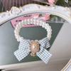 Collar de perlas para mascotas al por mayor de fábrica, collar de lazo a cuadros para gato, colgante de perlas para perro, collar de viento dulce