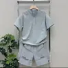 Traje de Verano Nuevo para Hombre de Seda de Hielo de Secado Rápido Moda con Cuello Alto Media Cremallera Manga Corta Pantalones Casuales de Malla Conjunto de Dos Piezas Moderno