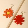 Pendientes bohemios de verano con flores de rafia tejidas a mano para vacaciones en la playa