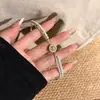 Pulsera de Estrella de Ocho Puntas tipo Brújula con Perlas Francesas Estilo Coco Chanel para Mujer Lujo Ligero Incrustaciones de Pedrería Tacto de Alta Gama Diseño de Nicho Pulsera de Doble Capa
