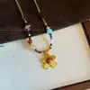 Collar Colgante Gota de Agua Piedra Ojo de Tigre Maillard Estilo Hong Kong Moda Versátil Cadena para Suéter Joyería de Nicho Venta al por Mayor