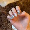 Azul Hielo ConchaEstilo Océano Fresco Concha Repujada 3D Decorada con Perlas Ojo de Gato Azul Hielo Uñas Portátiles Hechas a Mano