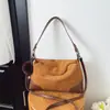 Bolsa transversal de camurça e pelúcia de alto valor, nova, nicho, transfronteiriça, para o dia a dia, sensação relaxada, cor sólida, feminina, de ombro único, sob o braço
