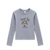 Camiseta blanca de cuello redondo, hombros normales, corte ajustado, manga larga para mujer, nuevo estilo de verano con estampado de pato de dibujos animados, top versátil