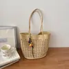 Bolso tote tejido hueco versátil simple y elegante de nicho nuevo 2026 transfronterizo, bolso de mano, bolso de hombro, bolso de axila