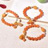 Pulsera de cuentas redondas de jade dorado natural con un solo círculo de cuentas redondas con colores cálidos y cálidos colores del sol.