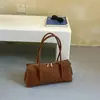 Bolso de mano de nicho estilo coreano Boston bag modelo nuevo primavera 2026 bolso de hombro simple y elegante con sensación de calidad para ir al trabajo y bolso cruzado de moda