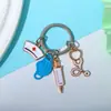 Jeringa Jeringa Estetoscopio Mascarilla Llavero Colgante para Bolsa de Personal Médico Regalo del Día de la Enfermera Souvenir