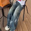 Calça reta de perna larga para comércio exterior, grafite estilo rua europeu e americano, moderna e descolada, lavada e com aspecto desgastado, modelagem solta, calça jeans com respingos de tinta para homens