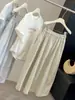 Saia de Botão Floral Estilo Coreano para Mulheres, Verão Elástica de Cintura Alta Emagrecedora Elegante Cor Sólida Versátil Casual Saia Midi em Linha A