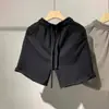 Marca de moda de calle Pantalones cortos de algodón Lavados Retro Borde Deshilachado para Hombres y Mujeres Verano Hip-Hop Sueltos Casual Rectos de Cinco Puntos Modernos