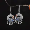 Carácter plata s925 plata moda retro azul quemado pavo real filigrana borla pendiente simple damas nicho pendientes