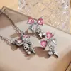 Collar con Colgante de Cruz y Estrella con Lazo de Diamante Rosa de Alta Gama Transfronterizo Europeo y Americano Set de Joyería para Mujeres