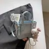 Bolso Cubo de Alto Valor Estilo Coreano para Mujer 2026 Nuevo Bolso de Mano Simple de Lujo Ligero Bolso Cruzado de Hombro Único para Viajes Casuales