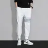 Pantalones de chándal de verano de punto gofrado para hombre, pantalones deportivos de marca modernos y versátiles, corte holgado, con puños, pantalones casuales grises