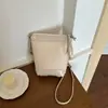 Bolso Pequeño Transfronterizo Nuevo Verano 2026 para Mujer, Bolso Cubo, Bolso de Hombro Cruzado Versátil de Patrón Tejido de Lujo Ligero de Alta Gama