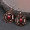 Pendientes de estilo étnico bohemio retro europeo y americano, pendientes de girasol, pendientes redondos de aleación, joyería de AliExpress para mujer.