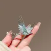 Broche de pájaro azul esmaltado de lujo ligero de alta gama con estilo europeo, diseño único, pasador personalizado, broche moderno y exquisito