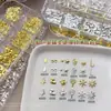 Navidad Clavo Remache Arte de Uñas Joyería Caja Larga Forma Especial Copo de Nieve Aleación Base Plana Diamante Pegatinas de Joyería para Uñas Metálicas 12 Rejillas