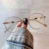 Qianai nuevos lentes anti luz azul montura ovalada de metal lentes lisos estilo coreano pierna de color personalizada montura para lentes de miopía
